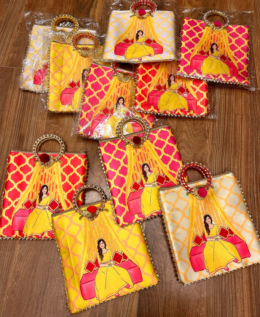 Haldi themed printed hand bags with beaded ring handles